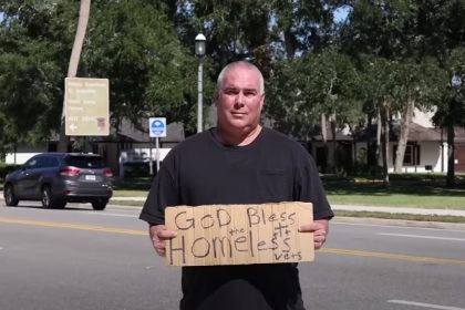 'God bless the homeless vets' sign activist wins legal settlement