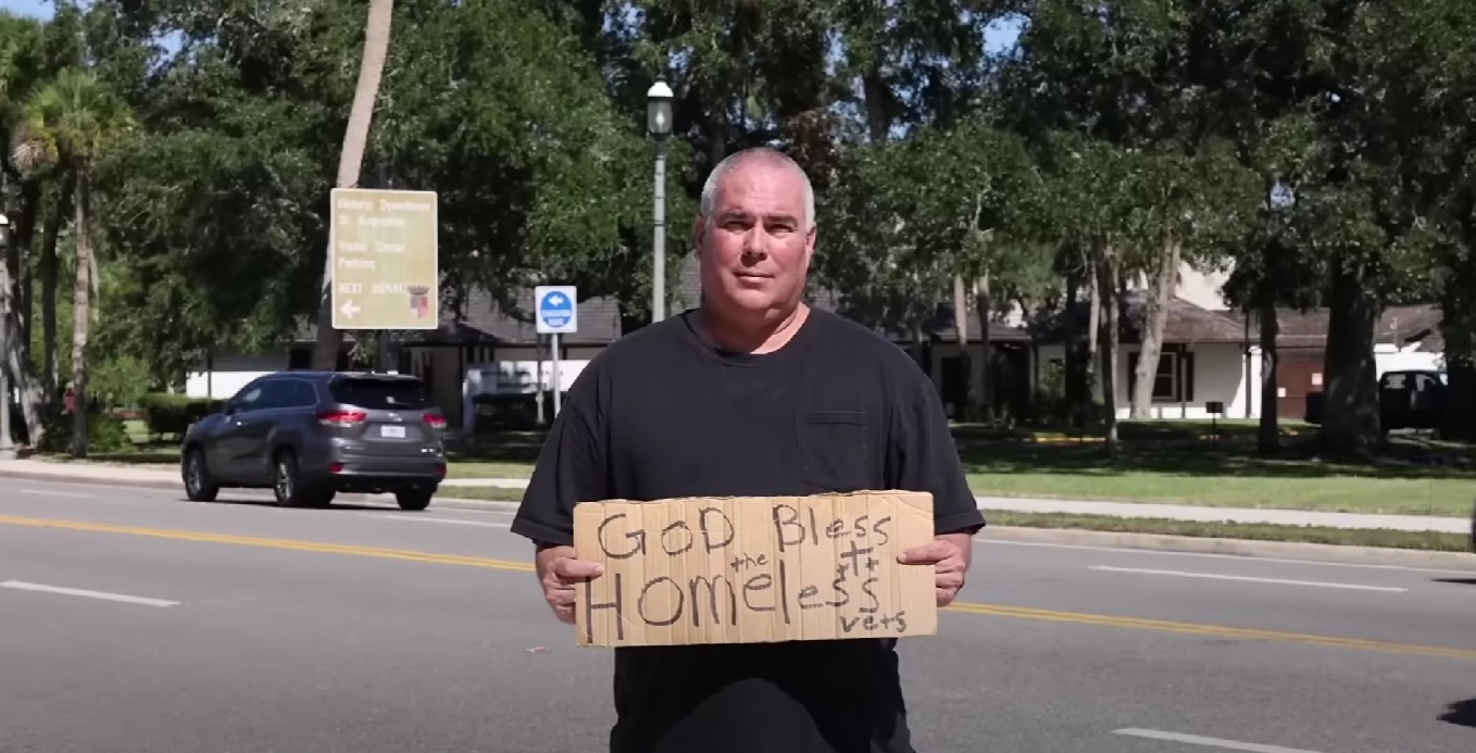 'God bless the homeless vets' sign activist wins legal settlement