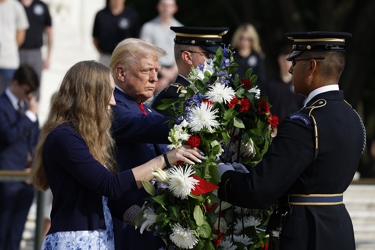 Fallen soldiers' families defend Trump amid cemetery trip fallout