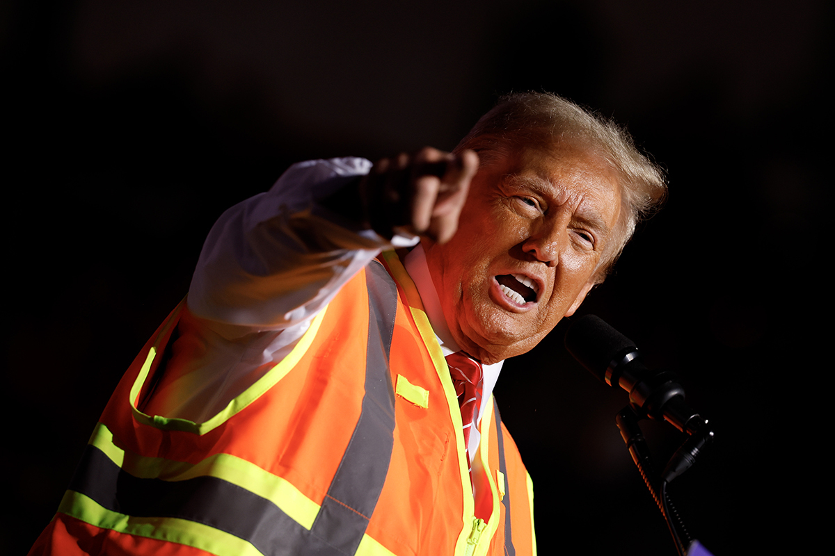 Trump trolls Harris, Biden with garbage truck press conference