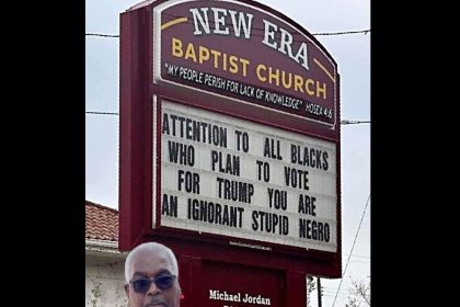 Pastor defends sign calling minority Trump supporters 'ignorant'