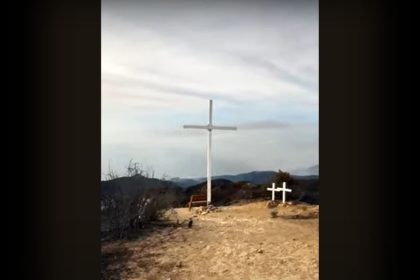 Wooden cross survives California wildfire unscathed