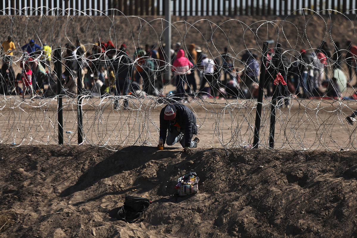 Migrants found padlocked inside U-Haul; 1 charged