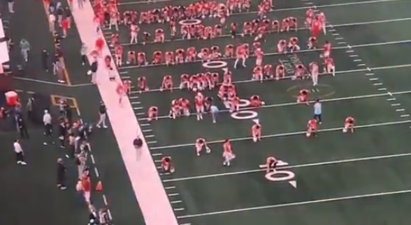 Ohio State players kneel in prayer on field before Cotton Bowl