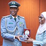 CGC Adeniyi Adewale presenting awards to TMP’s Managing Director, Dr. Jummai Umar-Ajijola,