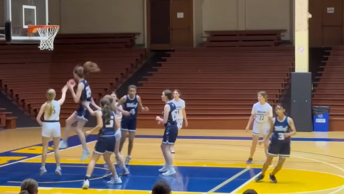 Christian girls' basketball team trounces team with male player