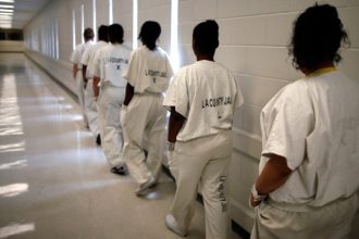 Mothering from behind prison walls: A local church co-parent
