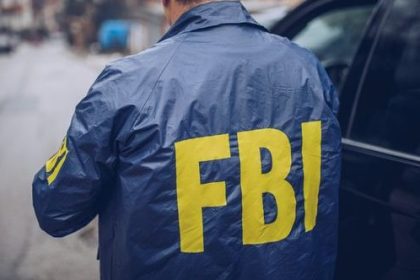 0_The-back-of-an-FBI-agent