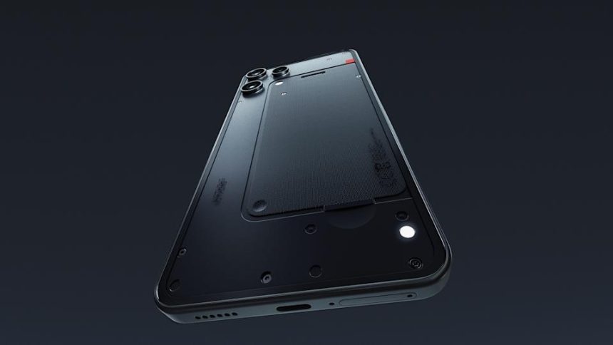 Dramatic view of the Nothing Phone 3a Lite smartphone. Its notification LED is lit, as the black phone floats against a dark background.