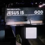 Man paints over heretical billboard to read 'Jesus is God'