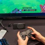 The MCON dock connects your phone to your TV for full-screen gameplay.